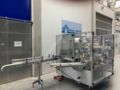 Skinetta ASK 450 BU Straffbanderolier-/Volleinschlagmaschine mit Schrumpftunnel