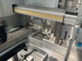 Skinetta ASK 450 BU Straffbanderolier-/Volleinschlagmaschine mit Schrumpftunnel
