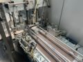 Skinetta ASK 450 BU Straffbanderolier-/Volleinschlagmaschine mit Schrumpftunnel