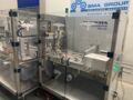 Skinetta ASK 450 BU Straffbanderolier-/Volleinschlagmaschine mit Schrumpftunnel